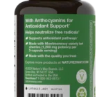 A bottle of Tart Cherry Ultra 90 vcaps by Natures Way, made in the USA, features a green cap and label highlighting antioxidant support with anthocyanins, tart cherry extract, usage info, and company contact details.