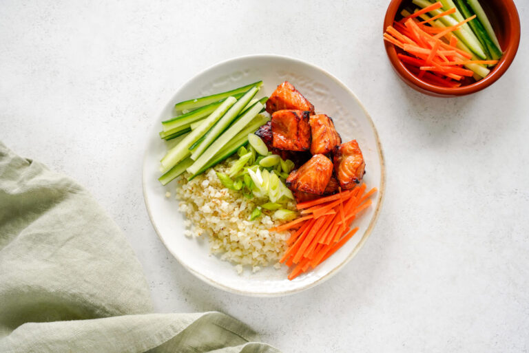 air fryer salmon & cauliflower rice bowl on a table