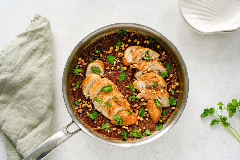 Miso chicken & quinoa in pan on table