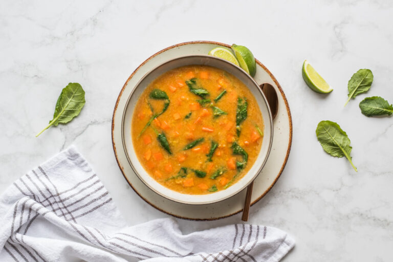 slow cooker curried red lentil soup in a bowl on a table