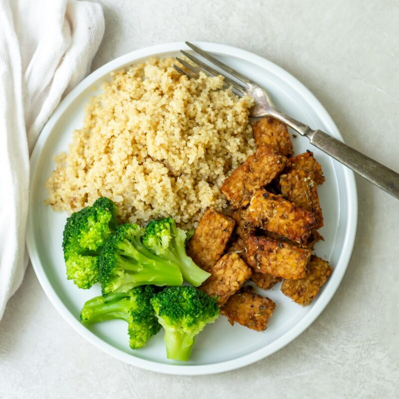 tempeh, quinoa, and broccoli on a plate as a recipe for menopause support