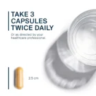 A yellow capsule of BCQ, 2.5 cm in size, next to a glass of water with text: "Take 3 capsules twice daily or as directed by your healthcare professional.